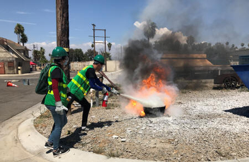 Guy putting fire out
