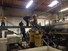 firefighters performing above ground rescue