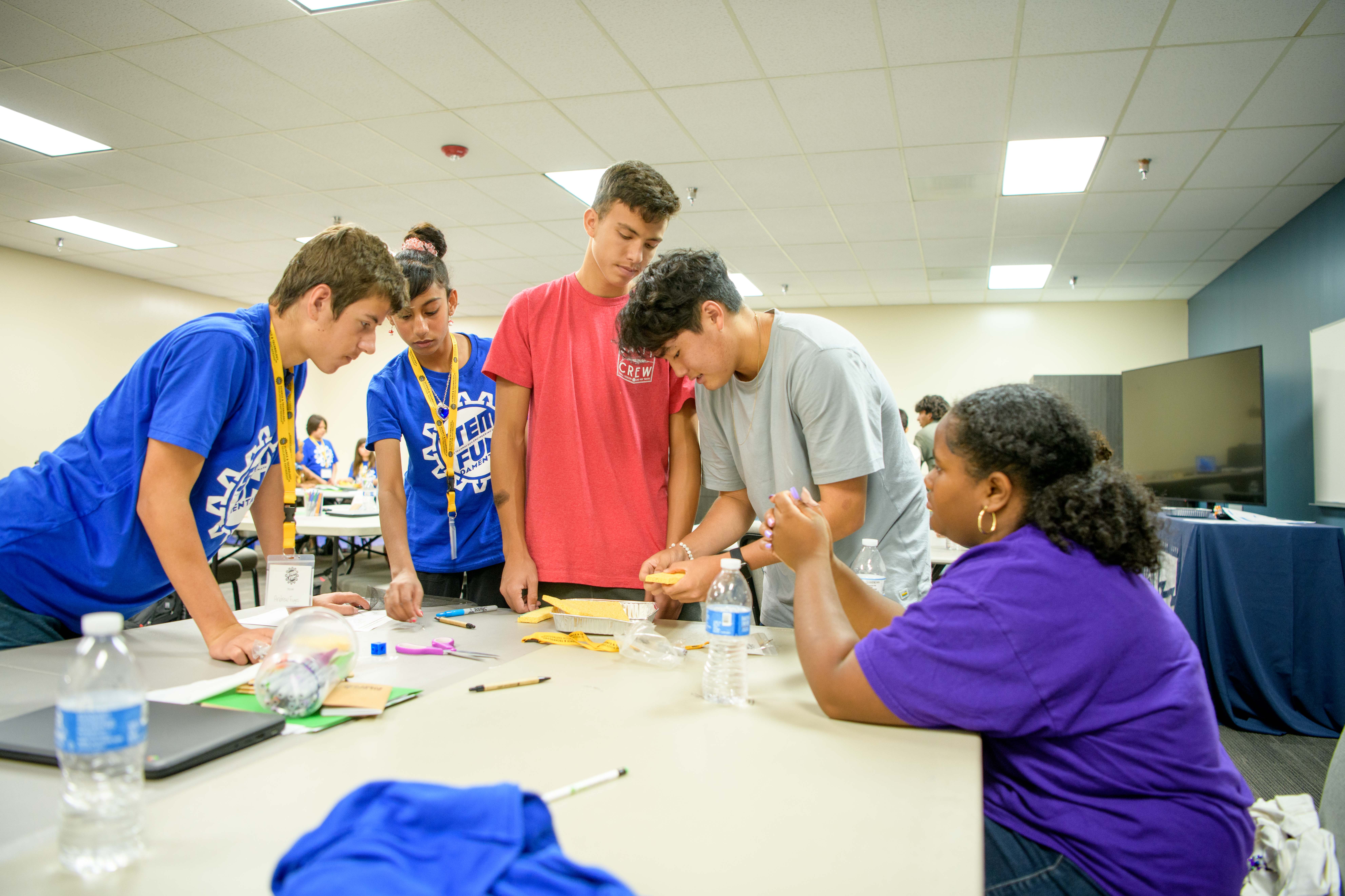 Students engaged in a Riverside Public Utilities summer learning experience