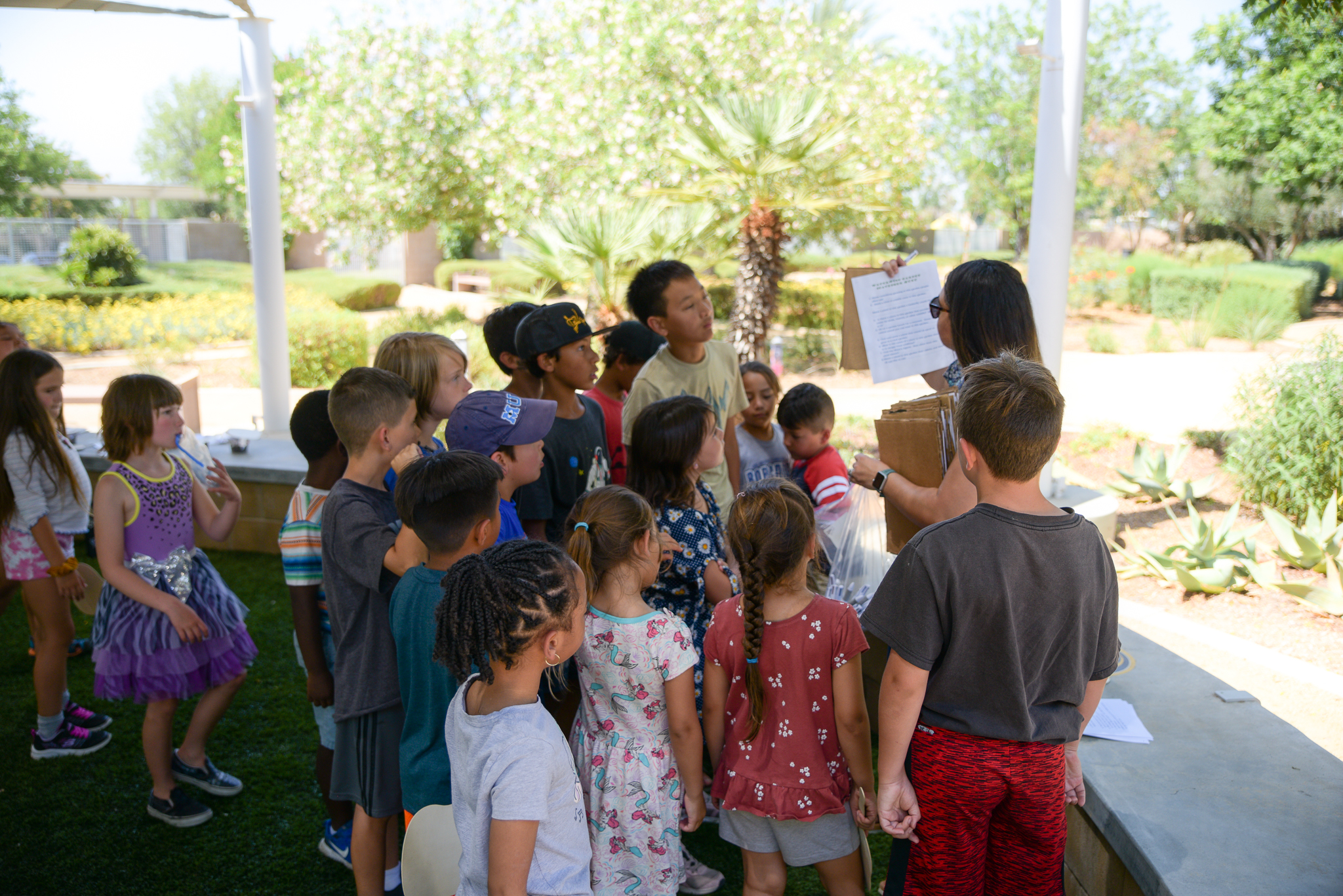 Riverside Public Utilities staff leading a hands-on learning experience for elementary students
