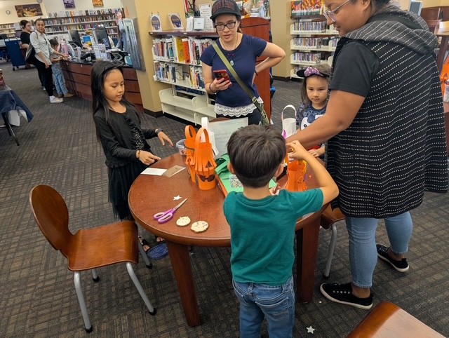 Families participating in a Riverside Public Utilities community STEAM event