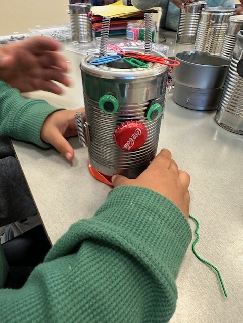 Community members engaging in hands-on science activities at a public event